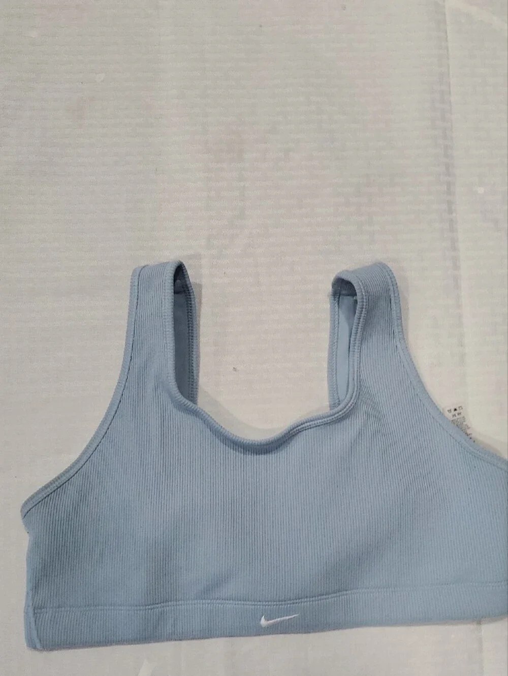 Nike Light Blue Tagged Apparel with Black Swoosh